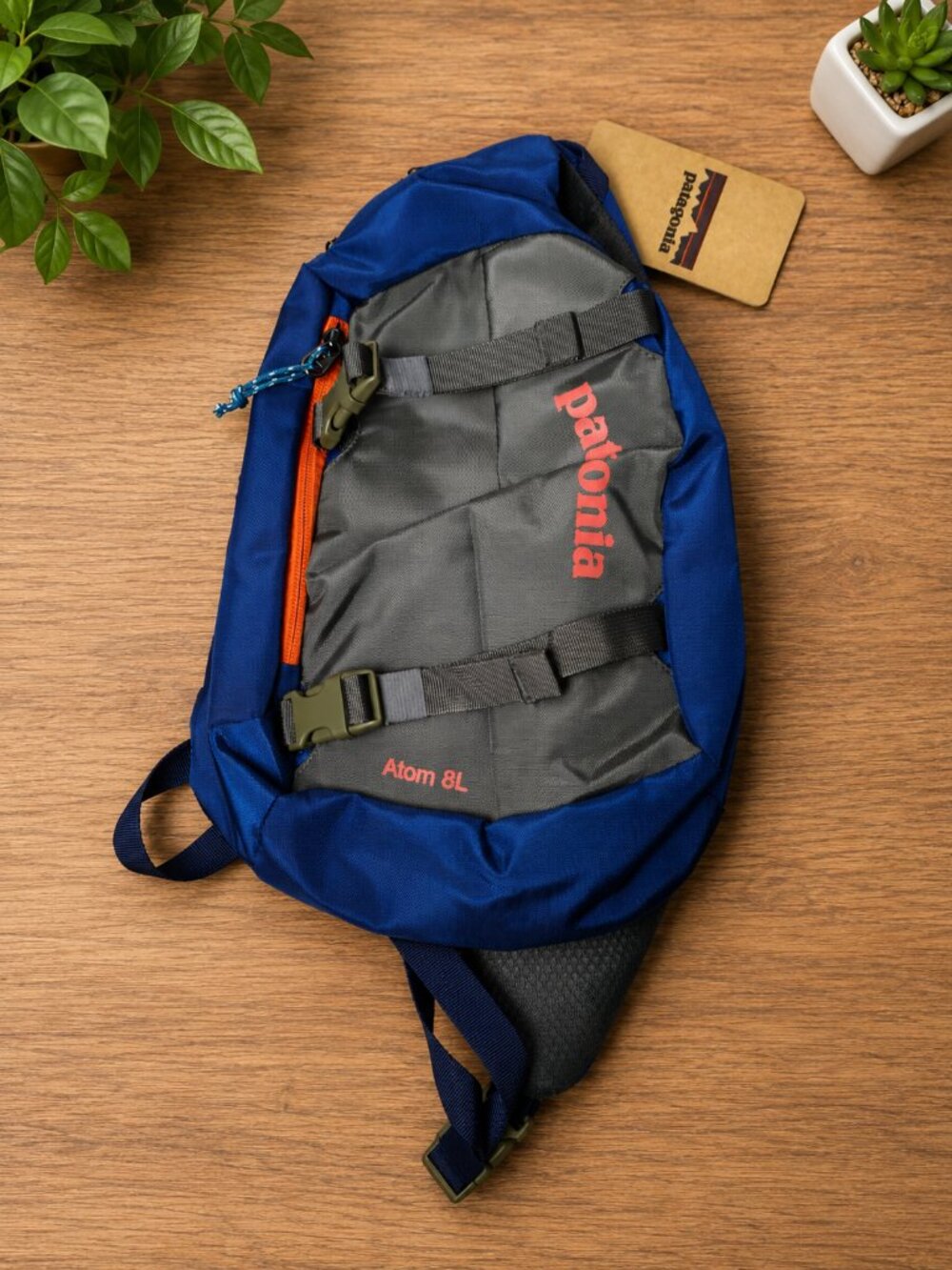 Patagonia Atom 8L Blue Gray and Orange Trim